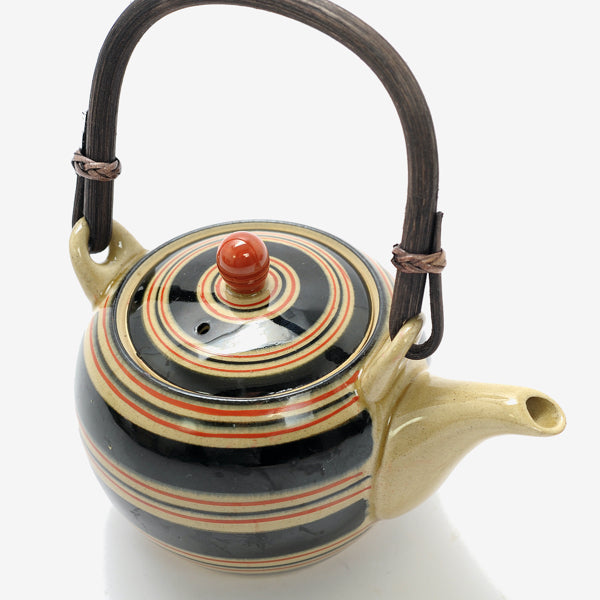 SPINNING TOP TEAPOT